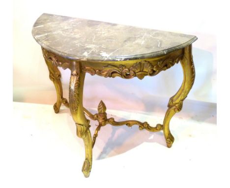 A French Gilded Demi-Lune Console Table, the variegated marble top above a carved pierced frieze raised upon cabriole legs wi