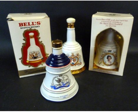 A Charles and Diana Porcelain Decanter by Wade, together with another commemorating the Queen's Birthday and two other simila