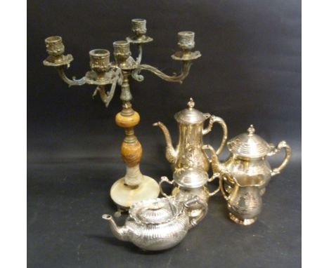 A Silver Plate Four Piece Tea Service, together with a silver plated teapot and a four branch candelabrum