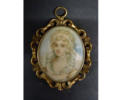 A 19th Century Oval Portrait Miniature, Study of a Lady in Period Dress, hair locket to reverse and within pierced shaped fra