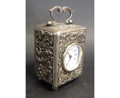 A London Silver Cased Travelling Carriage Clock within Embossed Case bearing French Movement
