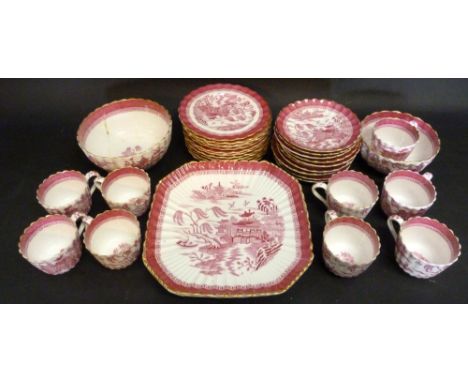 A Copeland Tea Service comprising cups and saucers, two bowls, two dishes with Willow pattern