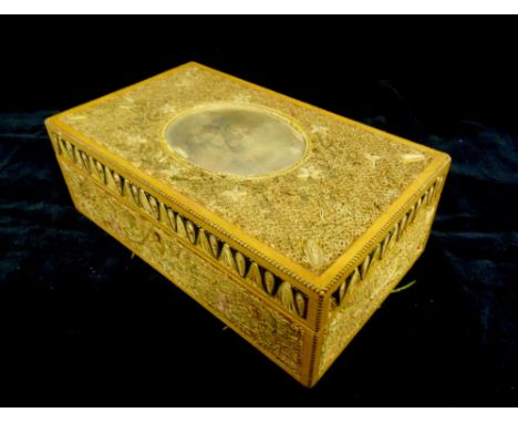 A George III Rolled Paper Rectangular Box, the hinged cover with a central oval portrait print, 21 cms wide, 12 cms deep, 7 c