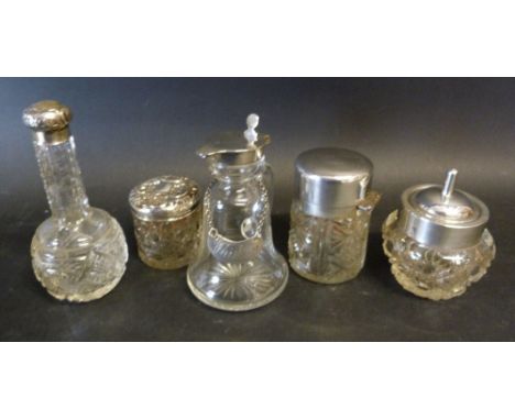 A Birmingham Silver Topped and Cut Glass Vinegar Bottle together with a silver decanter label and four silver topped cut glas