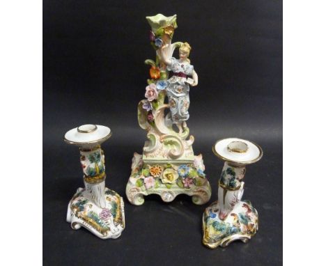 A German Porcelain Candlestick, together with a pair of Capodimonte candlesticks