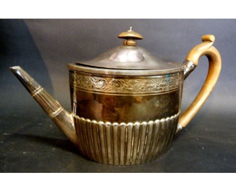 A George III Silver Teapot by Henry Chawner of Oval Half Lobed Form and with shaped handle and finial, London 1795, complete 