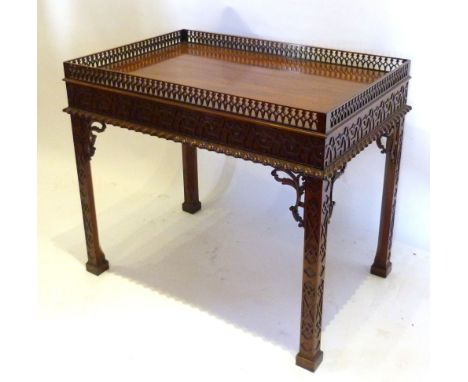 A Chinese Chippendale Style Mahogany Silver Table of Rectangular Form, with a pierced gallery above a blind fret work frieze 