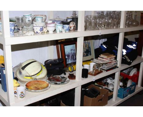 Full shelf of fireman related clothing, helmets, books, toys and collectables