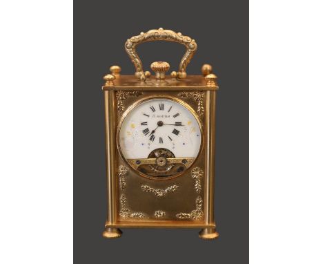 Edwardian gilded travelling clock fitted with 8 Day Hebdomas 8 day movement. The Case embossed with various Victorian Pastime