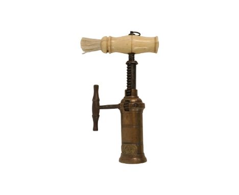 19thC English London Rack Corkscrew with turned bone handle with brush and hanging ring. Brass Barrel marked Patent between L