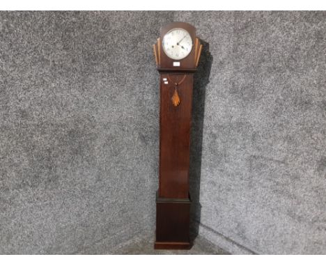 An art deco oak cased granddaughter clock by Haller with Arabic dial 155cm high.