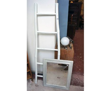 Decorative white bamboo ladder and wall mirror