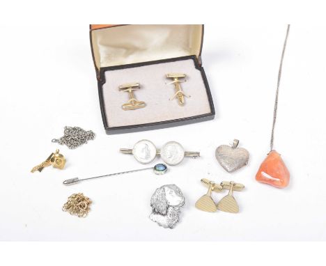 A selection of jewelleryTo include brooches, pendants, stick pins etc 