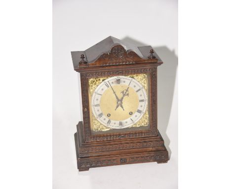 A late 19th/early 20th Century Winterhalder & Hofmier walnut cased bracket clockThe architectural case housing a 15cm brass d