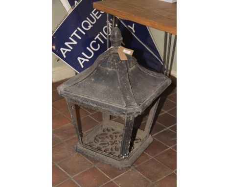 An early 20th Century painted metal street lamp canopyHaving an acorn shaped finial above a pagoda shaped top and tapering si