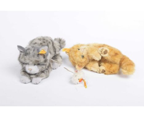 Three modern Steiff animalsComprising a small white mouse no. 032196, a marmalade kitten no. 074936 and a grey cat no. 075094
