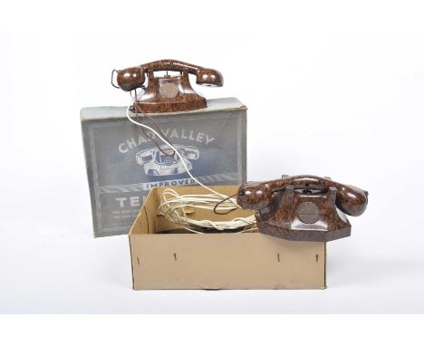 A boxed Chad Valley Improved telephoneContaining two bakelite telephones and a quantity of cable including installation instr