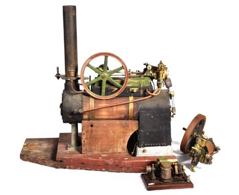 A substantial scratch built live steam stationary engineWith fire box, pistol with wheel and chimney, length 48cm, together w