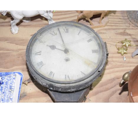 A late 19th Century wall clock With a 24cm white dial painted with Roman numerals having a single train movement.l 