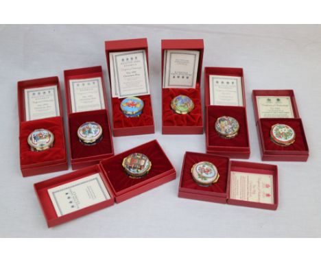 Eight boxed Halcyon Days Enamel Christmas Pots, various years all with COA's