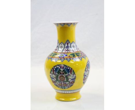 Vintage Chinese ceramic vase with Floral Roundel decoration on a Yellow ground and Blue Seal mark to base, stands approx 23.5