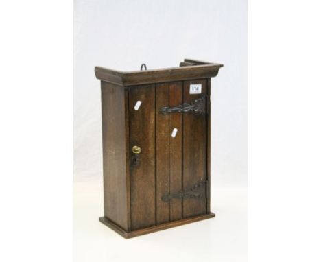 Vintage Oak wall mounted Cupboard with Art Nouveau style hinges to the door, comes with key, cupboard dimensions approx 45 x 