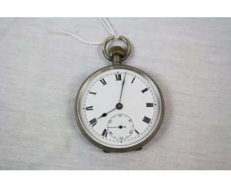 Hallmarked Silver Pocket watch, with Enamel Dial &amp; sub Dial at the six position, approx 46mm diameter with Engine turned 