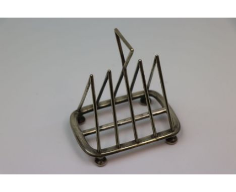 In the manner of Christopher Dresser,  Electroplated Toast Rack by Walker &amp; Hall