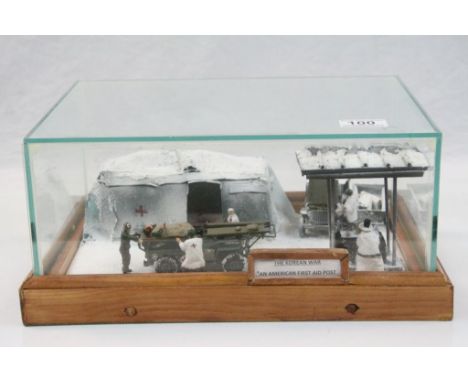 Cased Korean War Military Diorama showing a model of ' An American First Aid Post ', 