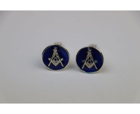 Pair of silver and enamel set cufflinks with Masonic symbol 