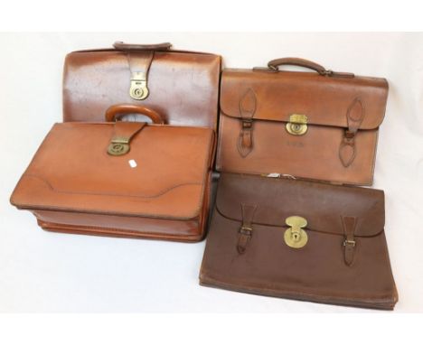 Two leather briefcases, two vintage leather brief cases and two similar attache cases 