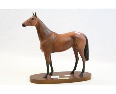 Royal Doulton ceramic model of Red Rum with Brass plaque to the wooden base, stands approx 32cm in total