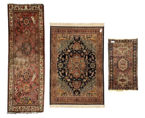 Belgian Sultan woollen ground rug, central navy field densely decorated with floral sprays and geometric patterns (192cm x 13