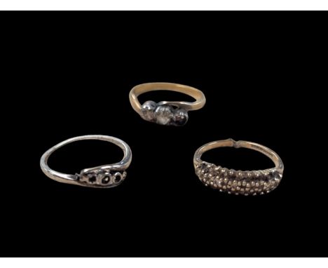 18ct gold diamond ring, 18ct white gold ring shank and a 9ct gold stone set ringCondition Report:18ct none stone set approx 1