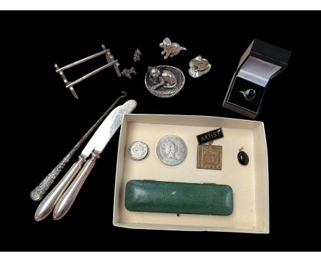 Pair of silver knife rests, two silver handled butter knives and a silver handled button hook, all hallmarked, together with 