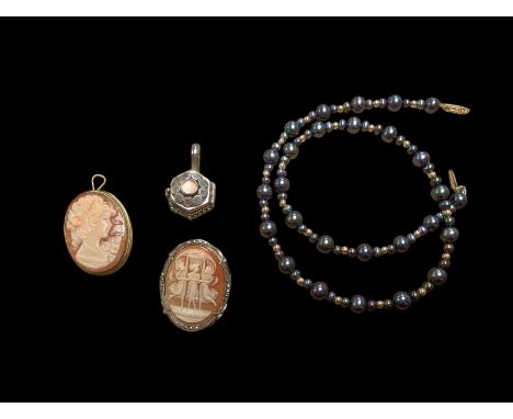 Beaded necklace with a 10ct gold clasp, two silver cameo brooches, and a silver trinket pendant