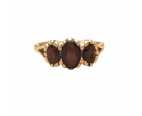 9ct gold three stone oval garnet ring, hallmarked Condition Report:Size N, approx 2.6 grams