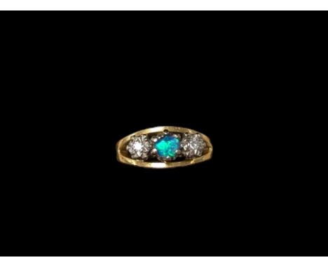 18ct gold opal and diamond ring, hallmarked Condition Report:Approx 4.88 grams, size K, chip to bottom of opal 