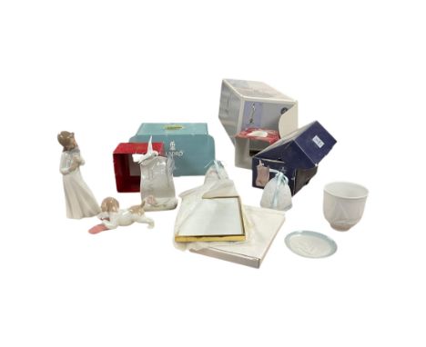Four Nao figures, together with Lladro Christmas bells, Art Brings us Together plaque etc, in two boxes 