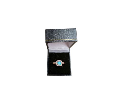 Silver-gilt cubic zirconia and opal ring, boxedCondition Report:Size T
