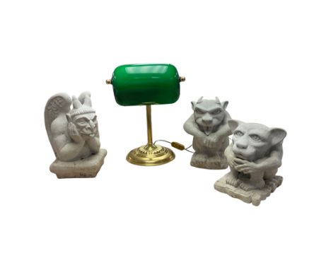 Bankers lamp, together with three composite gargoyles 