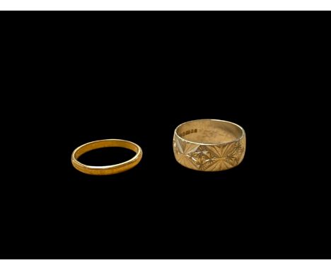 9ct white gold bright cut engraved ring and a 9ct gold wedding band, both hallmarked Condition Report:Approx 4 grams, both si
