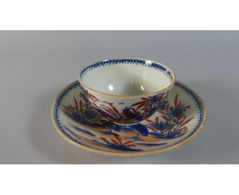 A Worcester Tea Bowl and Saucer, Two Quail Pattern in Blue, Iron Red and Gilt 