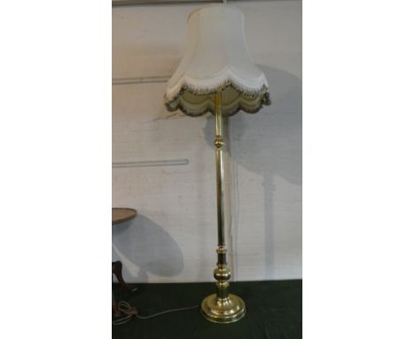 A Brass Standard Lamp with Shade Having Turned Support