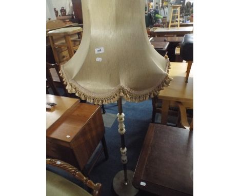An Onyx and Brass Standard Lamp with Shade