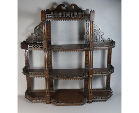 A Late Victorian/Edwardian Pierced and Carved Four Tier Whatnot Shelf, Some Losses 