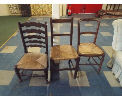 A Ladder Back Rush Seated Child's Chair and Two Bedroom Chairs