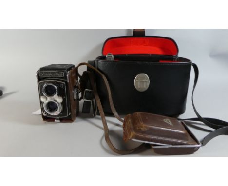 A Vintage Camera Case Containing Yashica-Mat Leather Cased Camera 