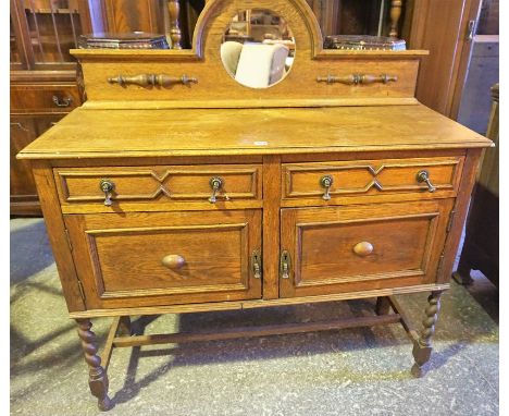 A Vintage Oak Sideboard, With a mirrored pediment above drawers and doors, 130cm high, 120cm wide, 47cm deep 