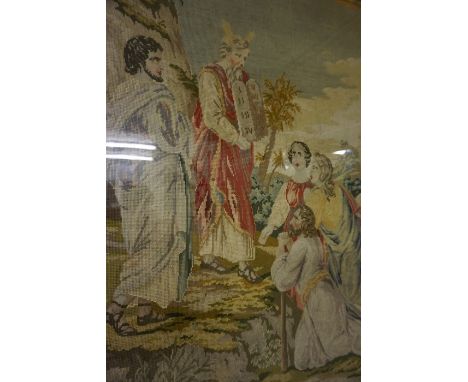 A 17th Century Style Needlepoint Panel, Depicting a religious scene, 78 x 65cm , framed in oak 